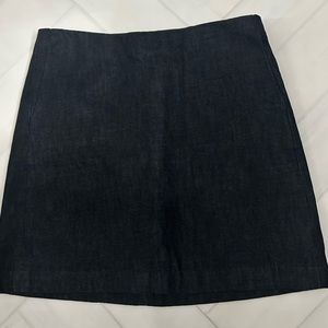 Adorable Dark Denim skirt! Pockets in front and fun zipper in back! Size 27!